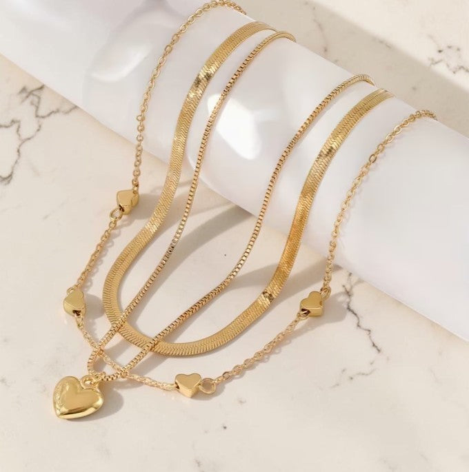 Golden Heart Layered Necklace Set – 3-Piece Heart Chain Stack